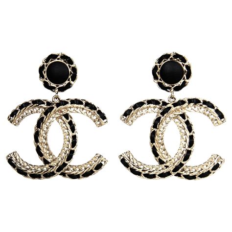 chanel gold hanging earrings|Chanel earrings online shop.